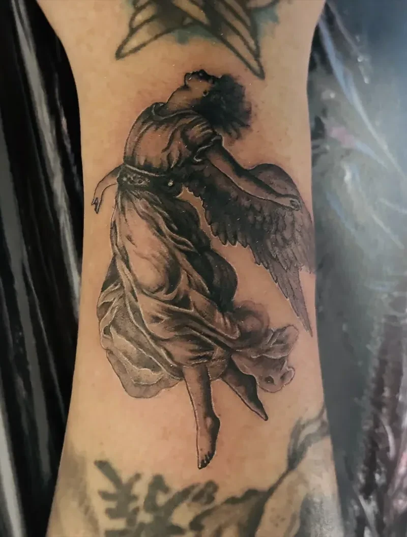 Compact black and grey tattoo by Michael Gumatay at Phantom Avenue, Edmonton