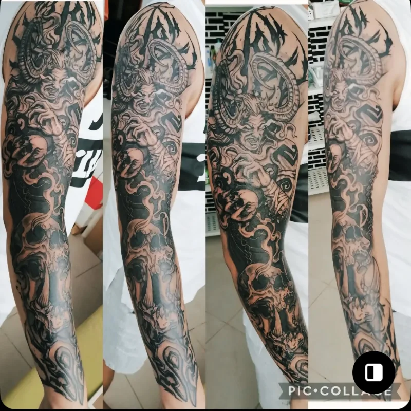 Large-scale black and grey tattoo by Michael Gumatay at Phantom Avenue, Edmonton